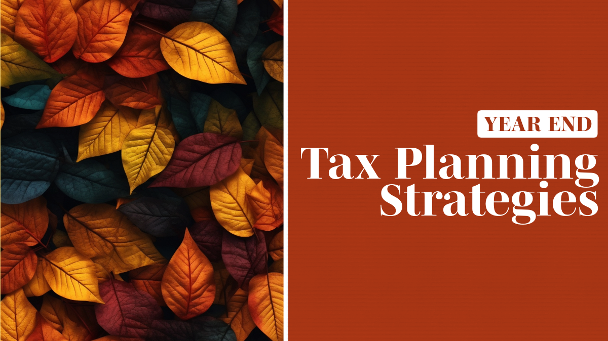 fall leaves next to sign that says year end tax planning strategies